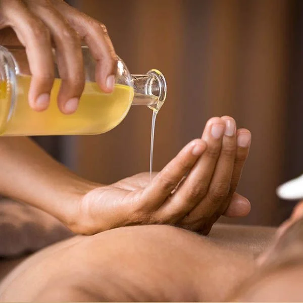 Warm oil massage therapy